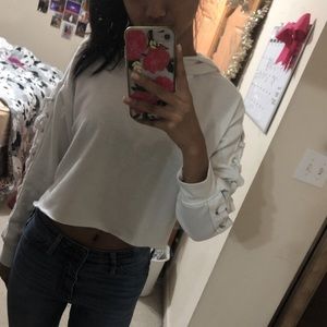 white cropped hoodie with lace up sleeves